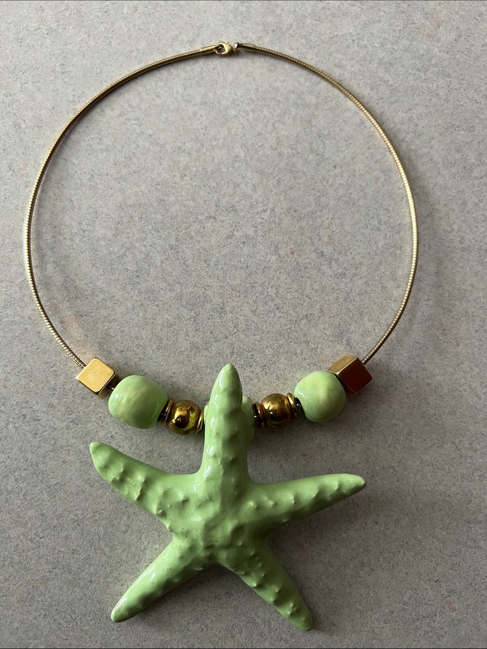 Gold-Tone Collar Necklace with Light Green Starfish Pendant
